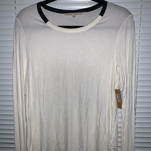 White long sleeved T-Shirt with faux leather trim.